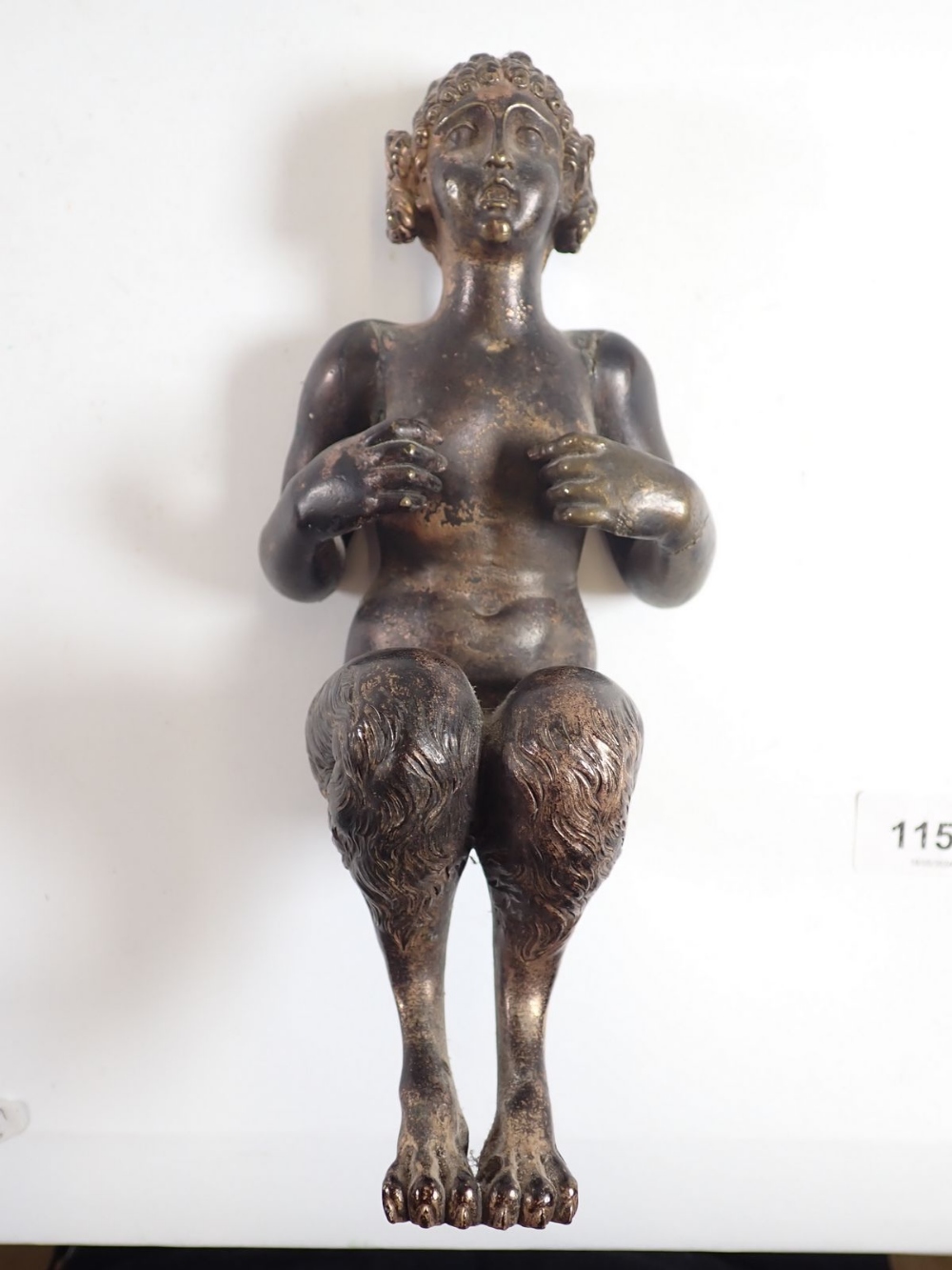 An antique bronze figure of a female faun seated (lacking base) 22cm tall - Image 4 of 4