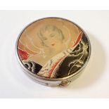An Art Deco compact with ladies face and stylised wave decoration, by Atkinson's 5cm diameter