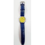 A Seiko 5 gents automatic wristwatch with yellow dial and blue leather strap