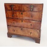 A George II walnut chest of two short and three long drawers on bracket supports, 86cm