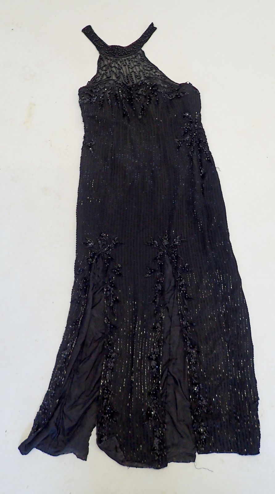A Diane Freis black bead evening dress, size L