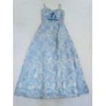 A vintage Lee Delman teal ball gown dress