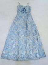 A vintage Lee Delman teal ball gown dress
