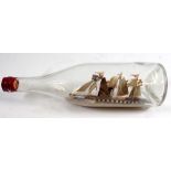 A Victorian model steam ship in a glass bottle, 28cm wide