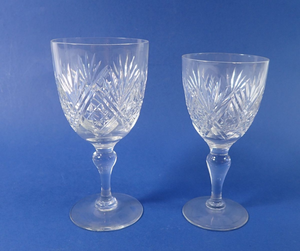 A set of fifteen large wine glasses, 15cm tall and sixteen smaller ones