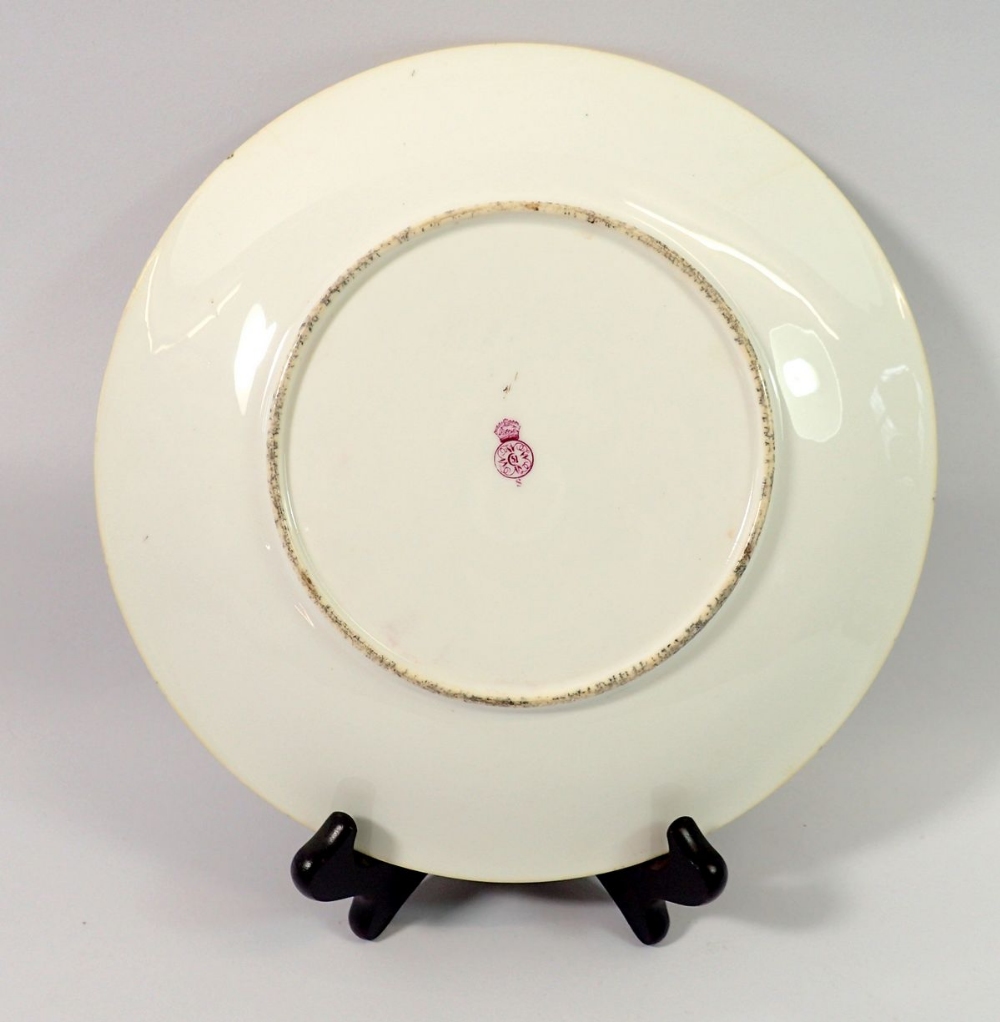 A Royal Worcester plate painted Scotsman and two ponies, with hairline crack, 23cm diameter - Image 2 of 2