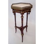 A French hexagonal marble topped mahogany occasional table with three slender supports united by