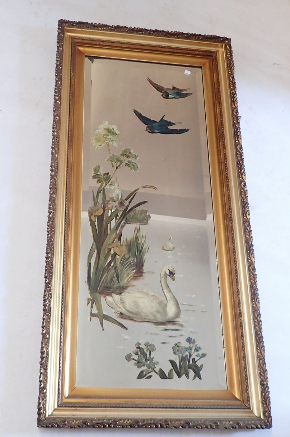 A Victorian gilt framed full length leaf moulded mirror painted birds and swan, 109 x 50.5cm