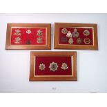 Three framed displays of military cap badges, three Cheshire, six with Prince of Wales plumes and