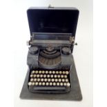 An old AMC typewriter, cased