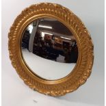 A gilt framed convex mirror, 41cm diameter