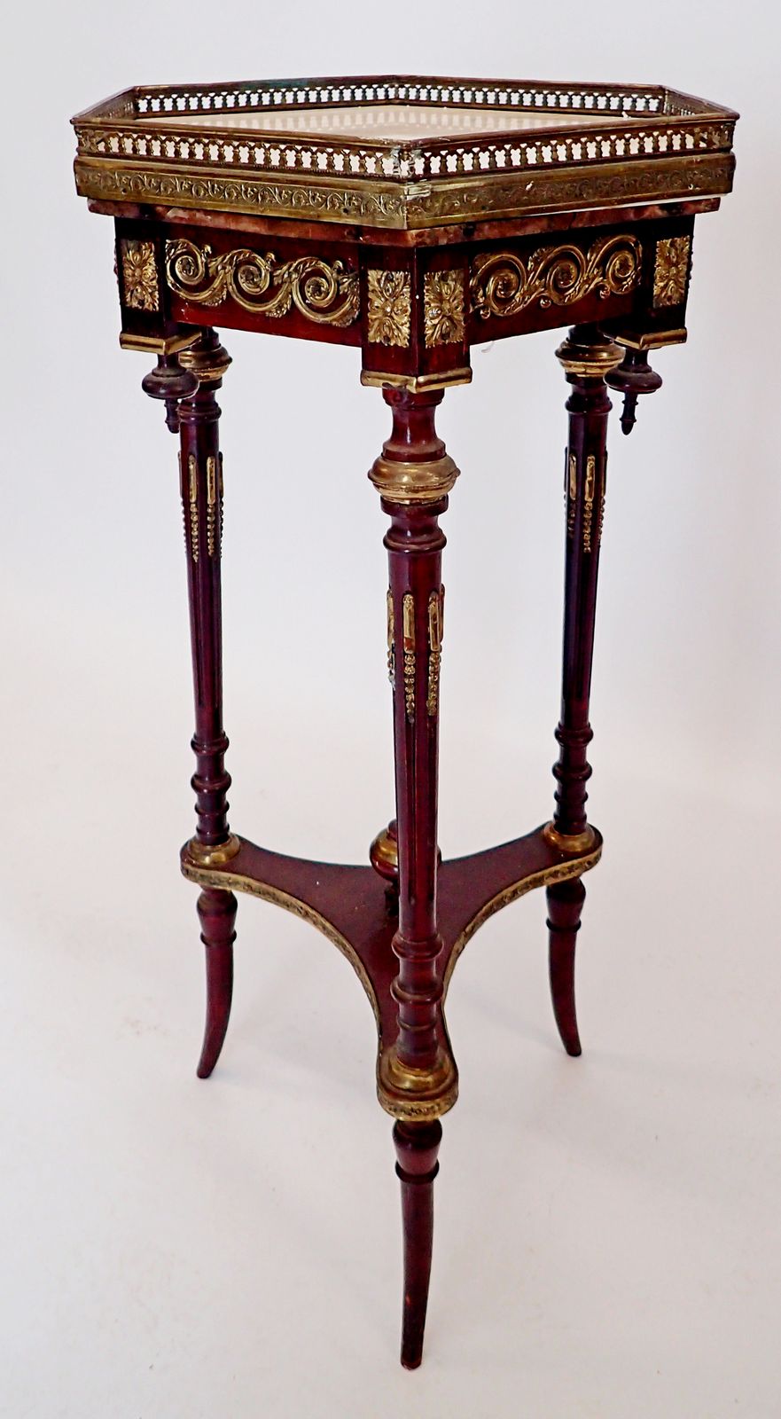 A French hexagonal marble topped mahogany occasional table with three slender supports united by - Image 3 of 3