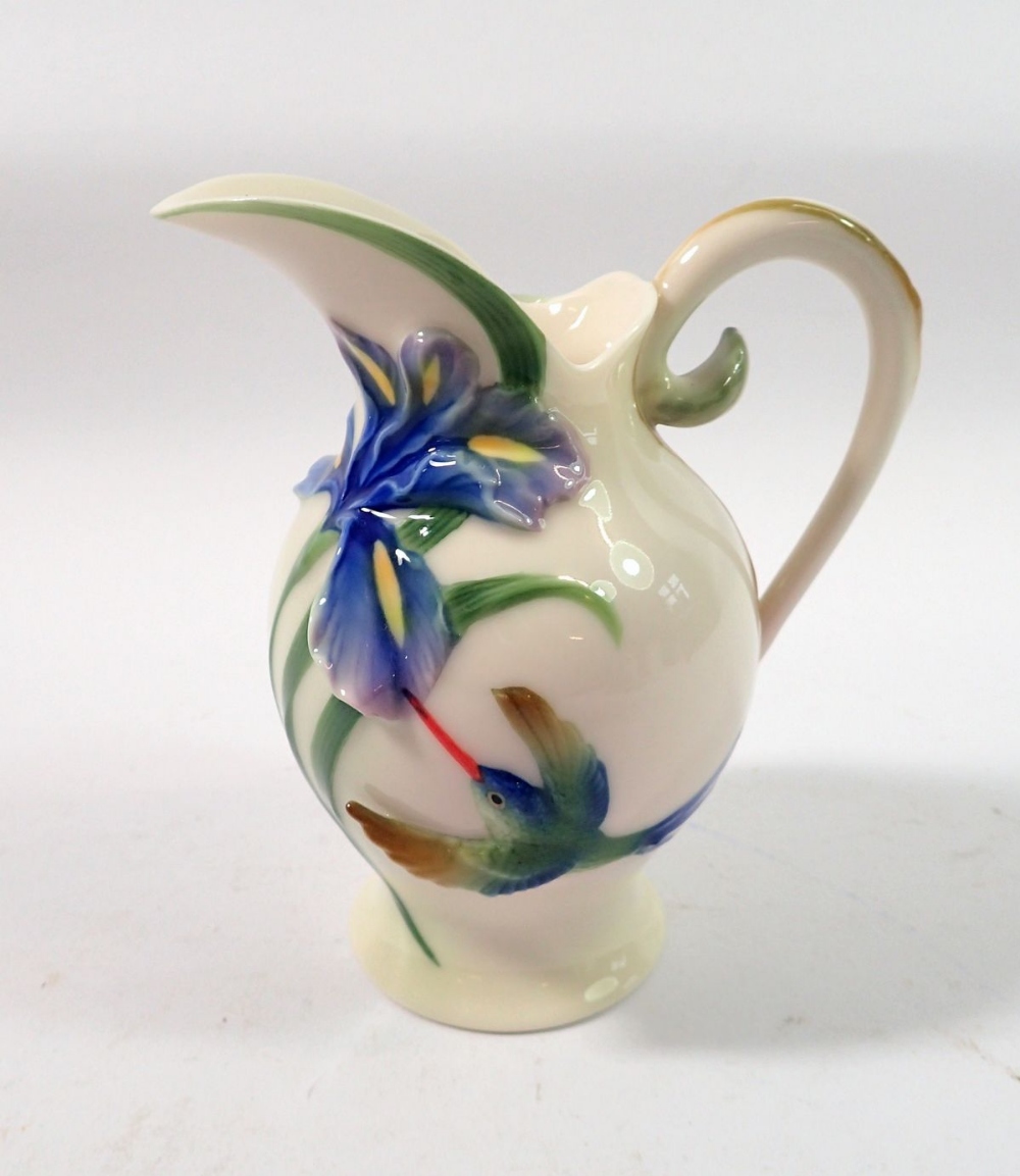 A Franz Porcelain collection Hummingbird cream jug, No FZ00133 in original box, 11cm
