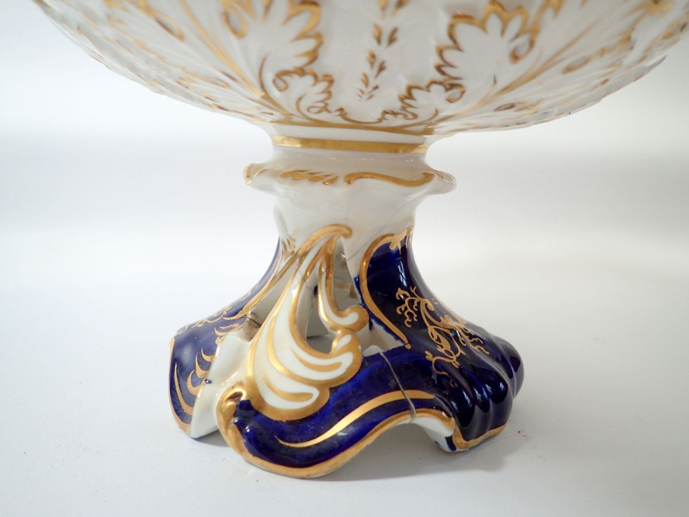 A large Victorian floral painted comport with blue and gilt reserves - a/f to base, 30cm wide - Image 2 of 2