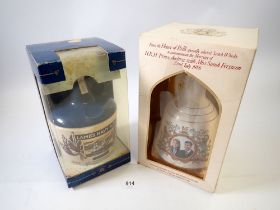 A Lams Navy Rum HMS Warrior flagon sealed in original box plus a Bells Whisky commemorative Prince