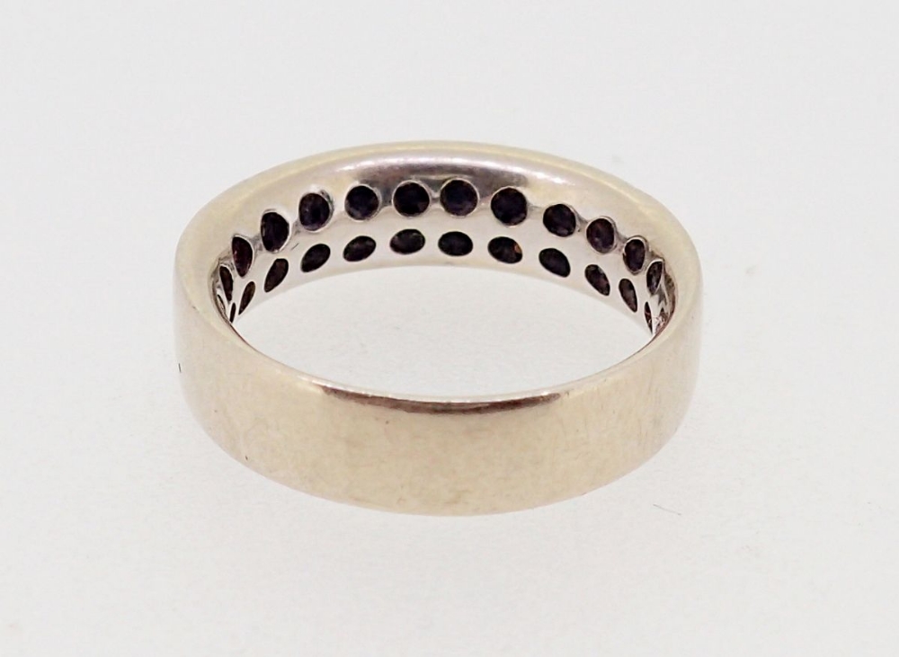 An 18 carat gold modern wide band ring set three rows of small diamonds, size H-I, 4.5g - Image 4 of 4