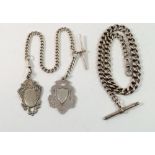 A silver shield form fob on silver plated chain with silver plated fob and a silver fob chain, total