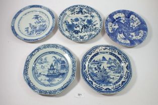 Two Chinese 18th century blue and white plates painted floral landscapes and two painted Pagoda