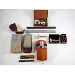 A box of collectables including Rolls Razors, cufflinks etc.