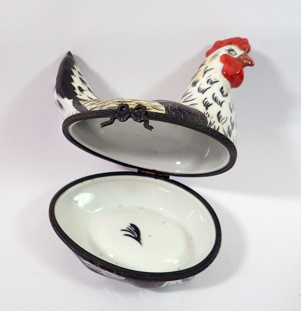 A Limoges trinket box in the form of a chicken with painted decoration, initialed E V, 10cm tall - Image 2 of 2