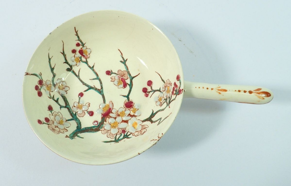 A 19th century Faience small dish with handle painted blossom by keller & guerin, 10cm diameter - Image 2 of 2