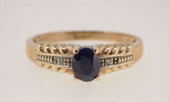 A 9 carat gold sapphire and diamond ring size L to M, 2g