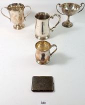 A group of silver plated items including trophy cups