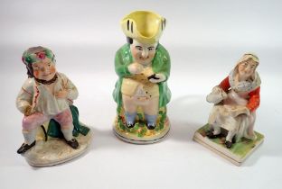 A Staffordshire figure of an old woman, a Bacchus figure, a/f and a Toby jug