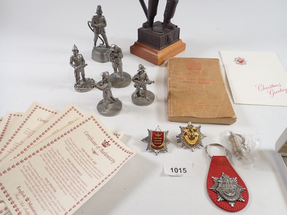 A group of English Miniatures fireman related figures, a figure of a fireman by R & V Green, 26cm - Image 2 of 3