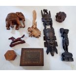 A collection of woodenware including ethnic hardwood figures, Buddha, card bird, box etc.