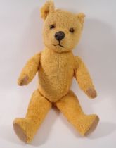An early 20th century gold mohair teddy bear, 51cm