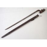 A 19th century socket bayonet and scabbard