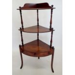 A 19th century mahogany corner whatnot with turned supports and drawer to apron, 126cm tall