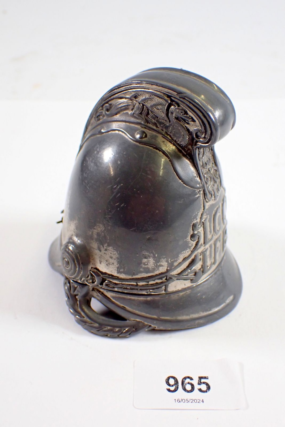 A novelty inkwell in form of a London fireman's helmet, LCC LBF, 10cm