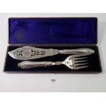 A Victorian silver plated set of fish servers, boxed with pierced and engraved decoration