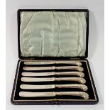 A set of six silver pistol grip tea knives with silver blades, Sheffield 1910, boxed, total weight