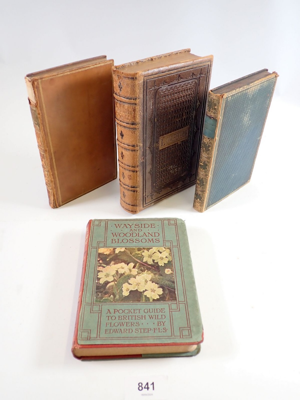 Three leather books comprising 'The Princess' by Tennyson 1861, The Poetical Works of Longfellow