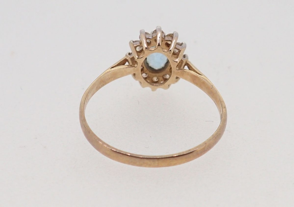 A 9 carat gold blue topaz and white stone cluster ring, size N, 1.5g - Image 5 of 5