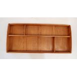 An Ercol lightwood display shelf, 107cm wide