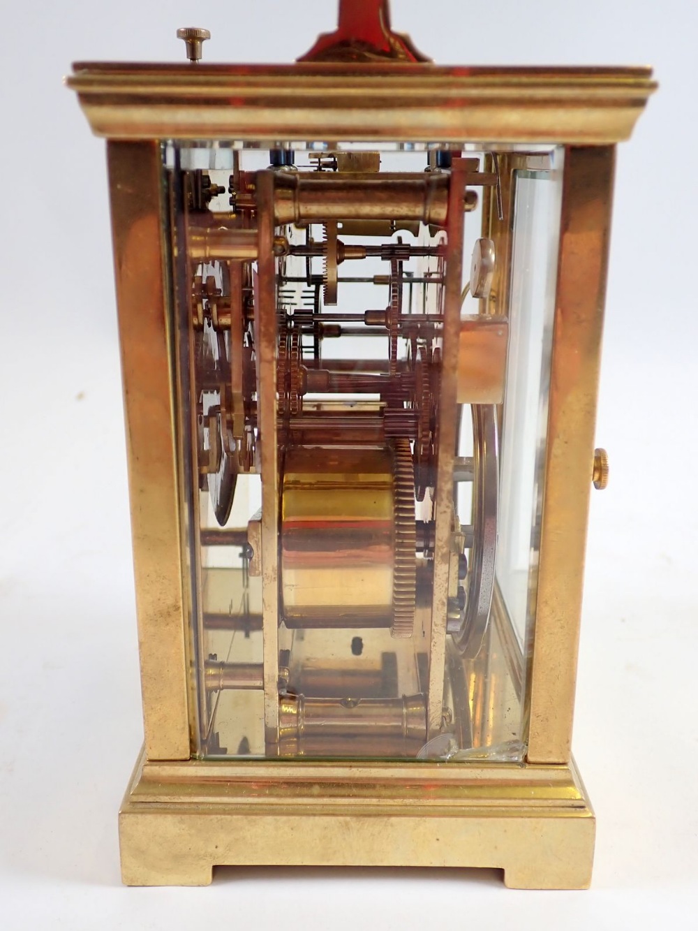 A brass carriage clock retailed by Marcks & Co Ltd, Bombay, presented to Mr Chatterton in Nagpur - Image 5 of 6