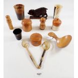 A group of treen and horn including tumblers, whistle spoon, a Swiss cheese scoop etc.