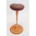 A French early 20th century dentists stool with swivel seat on metal stem with flexible ball joint