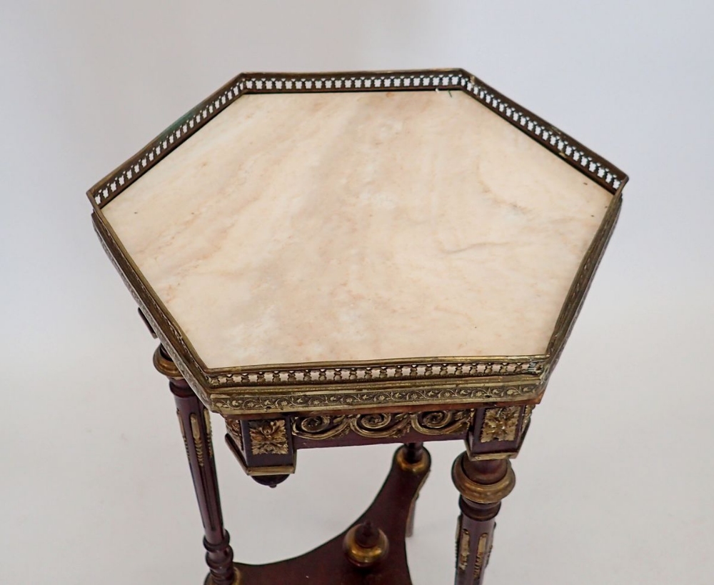 A French hexagonal marble topped mahogany occasional table with three slender supports united by - Image 2 of 3