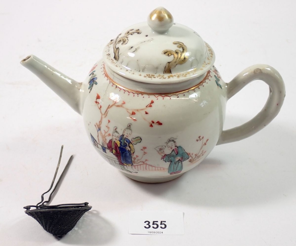 A Chinese 18th century famille rose teapot painted ladies and attendant in a garden 14cm tall with