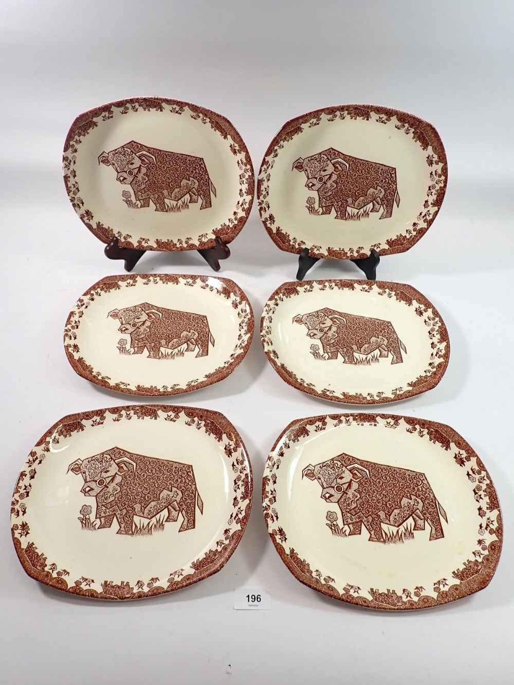 A set of six English Ironstone steak plates printed bulls