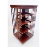 An Edwardian mahogany large square bookcase, this bookcase does not revolve 137cm x 71cm x 71cm