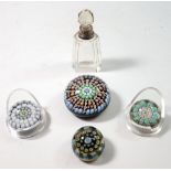 A Perthshire glass paperweight and three small Milliefiori ones and a glass and silver collar