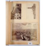 A late 19th century album of American photographs, mainly city scenes plus some track and train