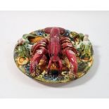 A Palissy style lobster plate, 18cm diameter