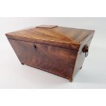 A 19th century mahogany tea caddy with lion ring handles and ball feet, 30.5cm wide
